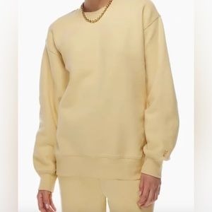 TNA Cozy fleece crewneck from Aritzia